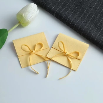 Търговия на едро Опаковка Торбичка Жълто Бижу от микрофибър Пръстен, Обеци и Чанта-плик за съхранение на шоколадови бонбони, Подарък за годишнина от сватбата